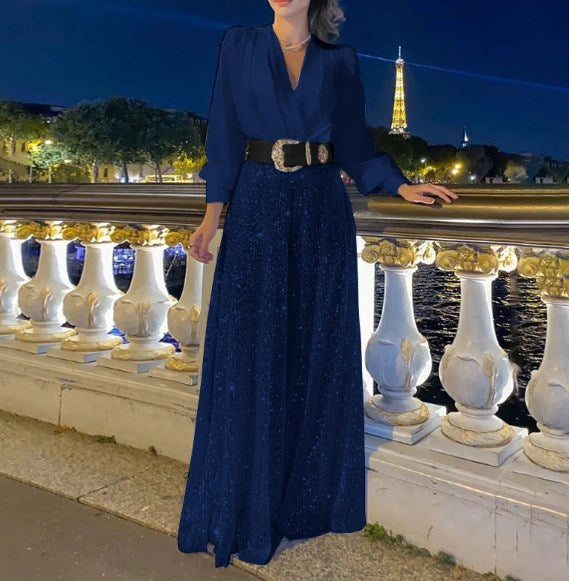 Elegantna bluza z dolgimi rokavi in V-izrezom ter široke hlače z bleščicami