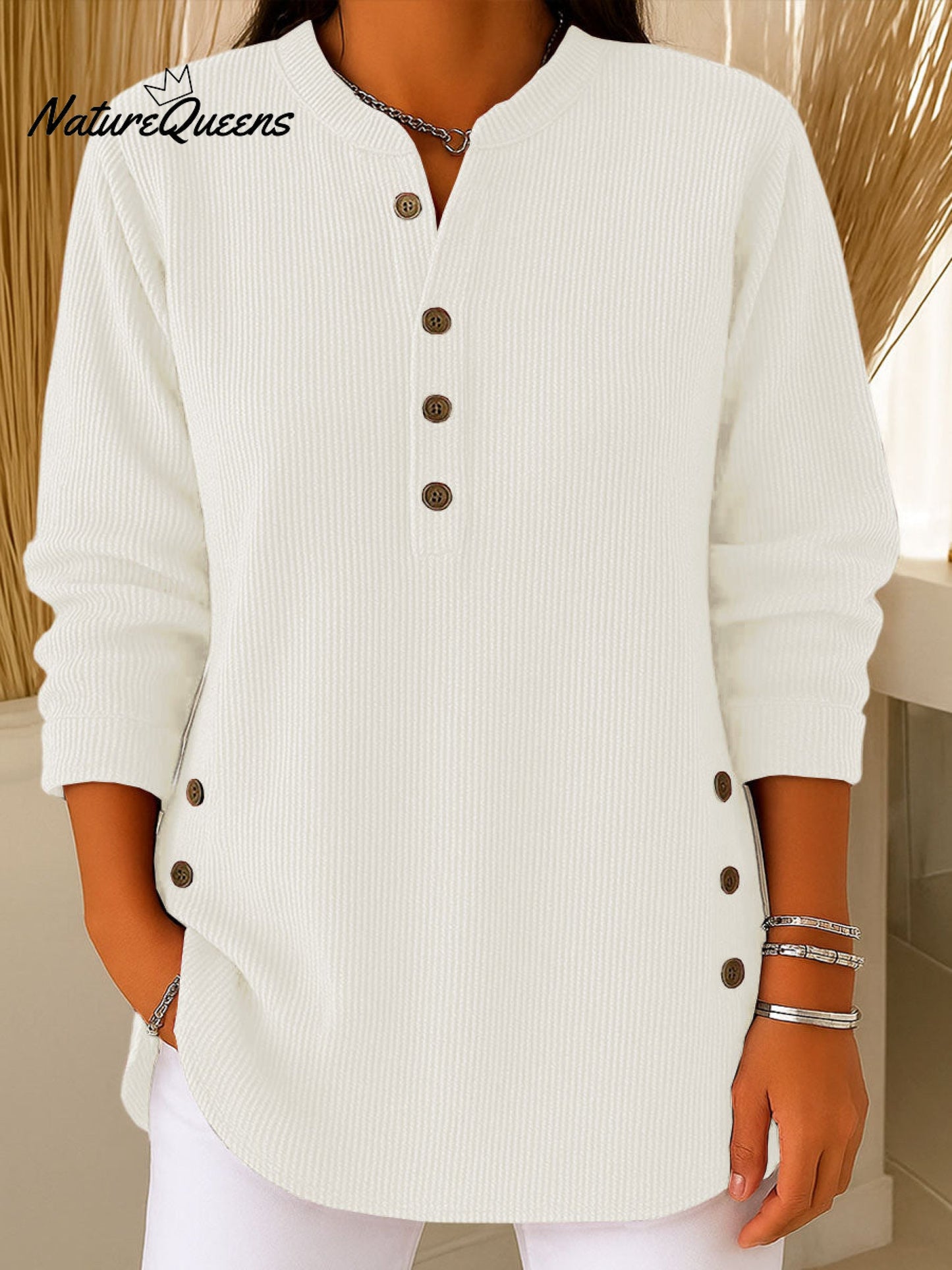 Ženski pulover iz ohlapnega pletenja z dolgimi rokavi in enobarvnim vzorcem