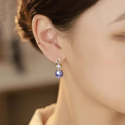 Ženski viseči uhani