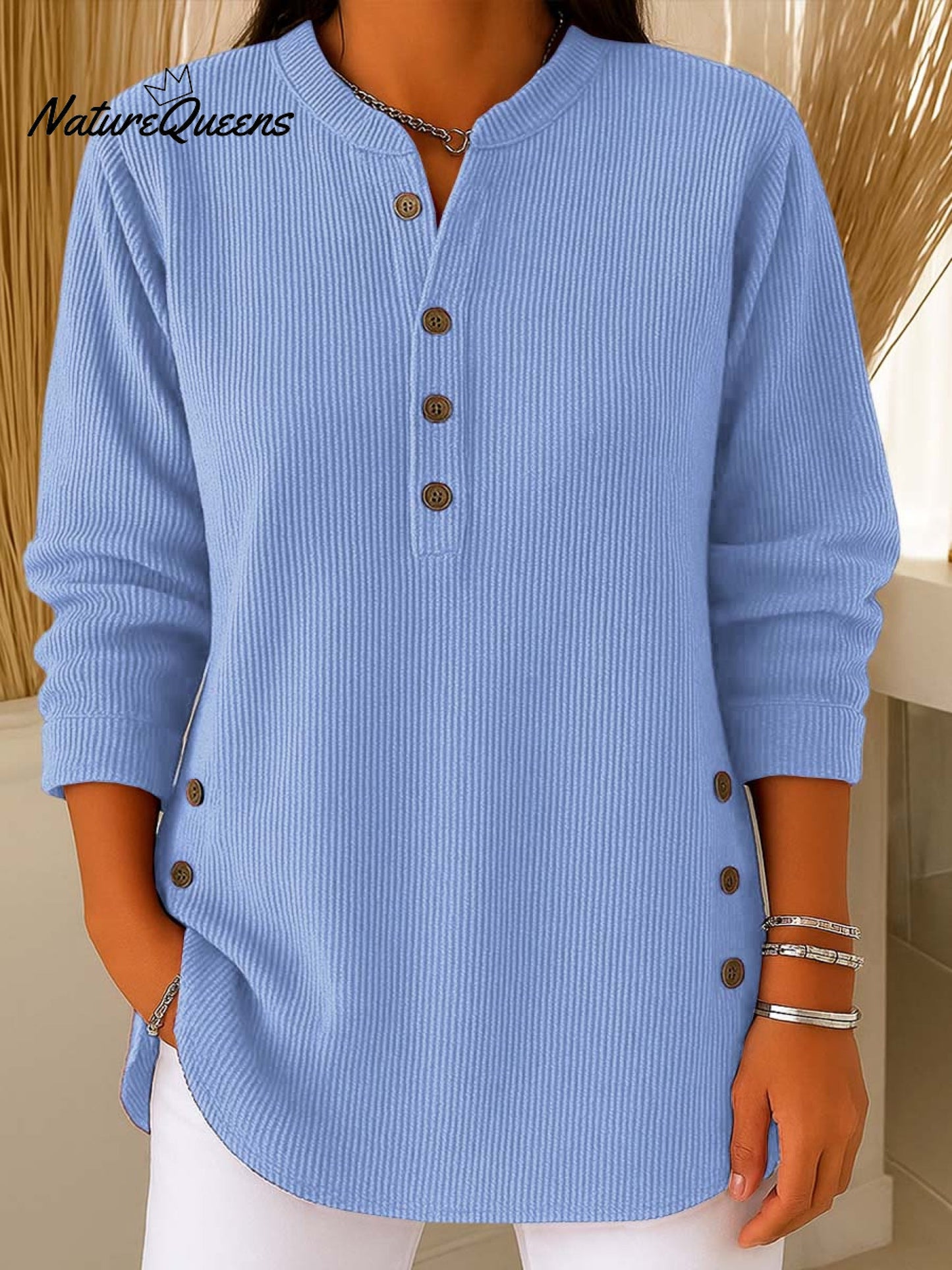 Ženski pulover iz ohlapnega pletenja z dolgimi rokavi in enobarvnim vzorcem